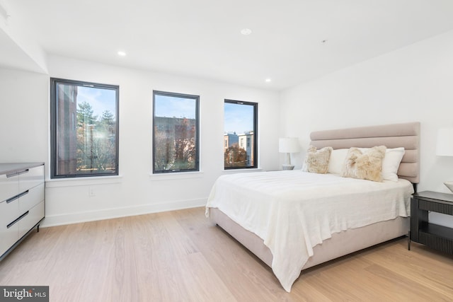 bedroom featuring light wood-type flooring