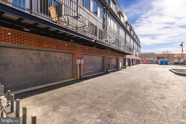 view of building exterior featuring a garage