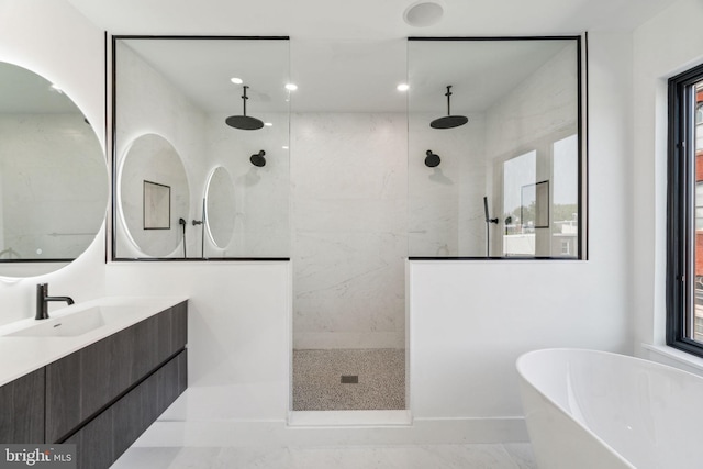 bathroom with vanity, separate shower and tub, and tile patterned flooring