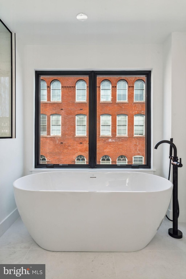 bathroom with tile patterned floors