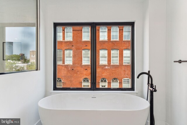 bathroom featuring a healthy amount of sunlight