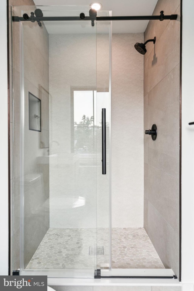 bathroom with an enclosed shower