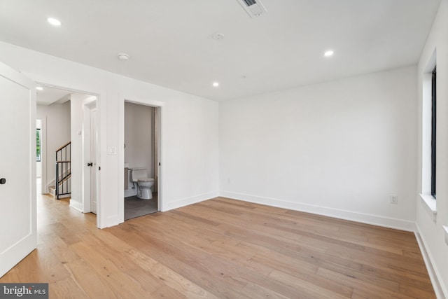 empty room featuring light hardwood / wood-style floors