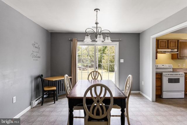 dining room featuring a chandelier