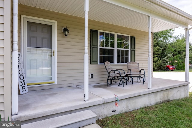 view of patio featuring a porch