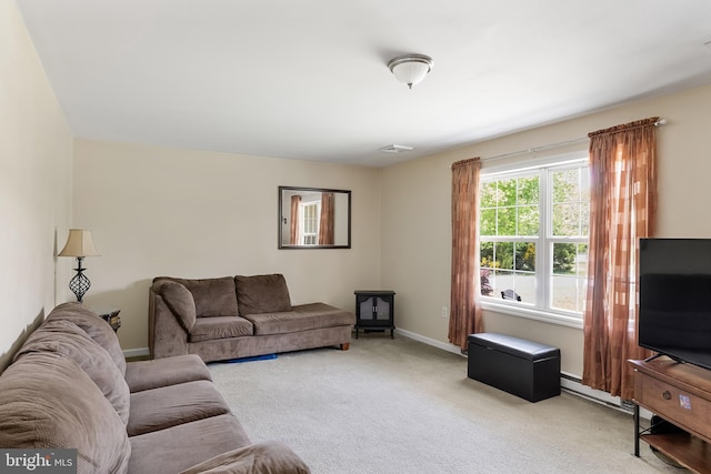 living room with light carpet and a baseboard radiator