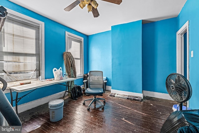 office area featuring ceiling fan and dark wood-type flooring