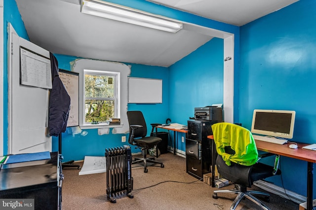 home office featuring radiator heating unit and light colored carpet