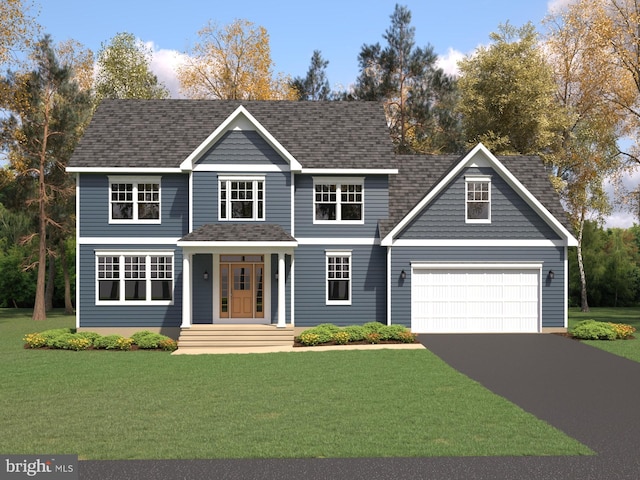 view of front of property featuring a garage and a front lawn