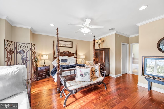 bedroom featuring crown molding, hardwood / wood-style flooring, and ceiling fan