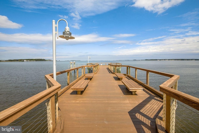 view of dock with a water view