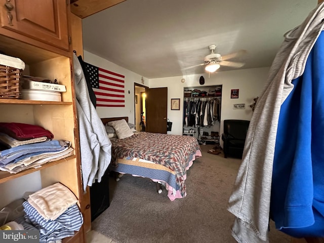 bedroom with ceiling fan, a closet, and light colored carpet