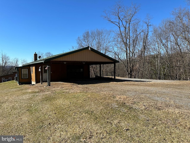 view of home's exterior with a yard