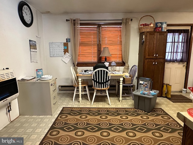 dining area featuring light tile flooring