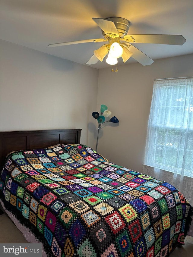 bedroom featuring ceiling fan