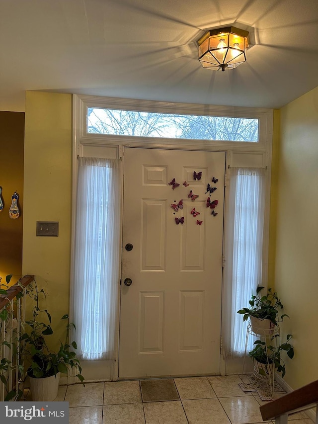 view of tiled foyer entrance