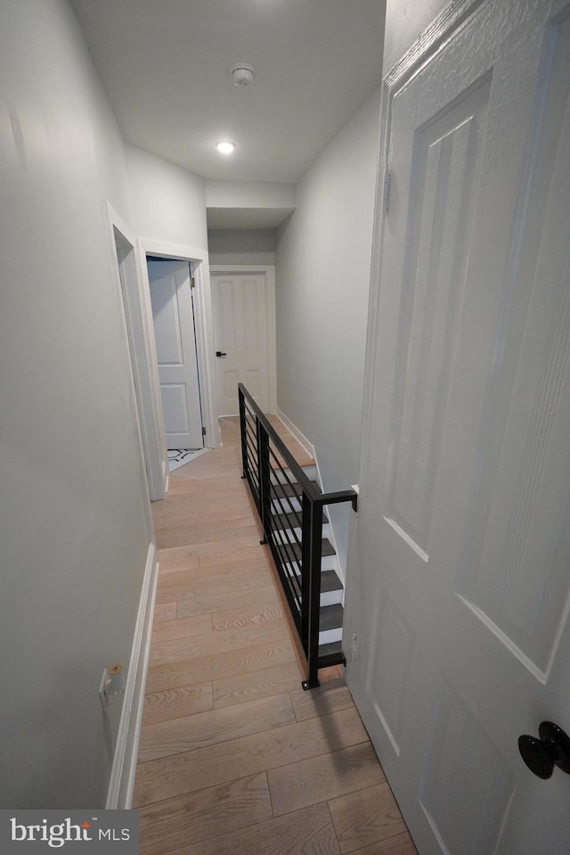 hallway featuring light wood-type flooring