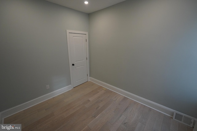 spare room with light hardwood / wood-style floors