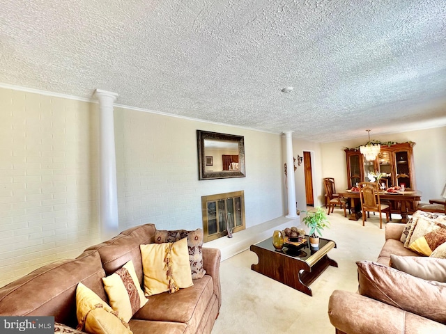 living room featuring light carpet, a textured ceiling, and a chandelier