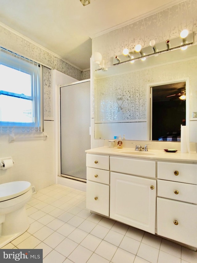 bathroom with toilet, large vanity, ceiling fan, walk in shower, and tile flooring