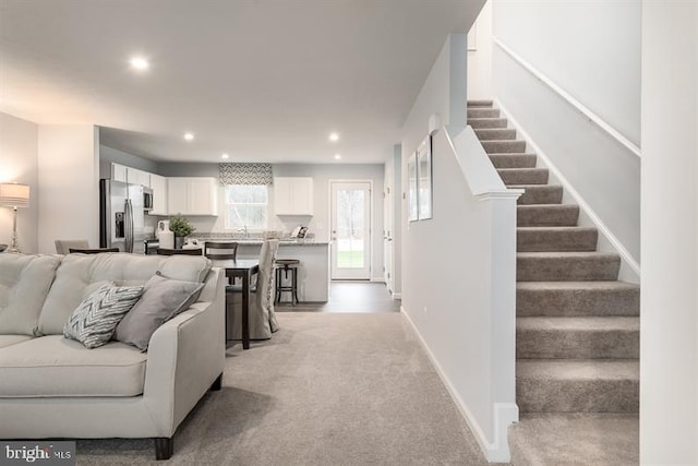 living room with light carpet