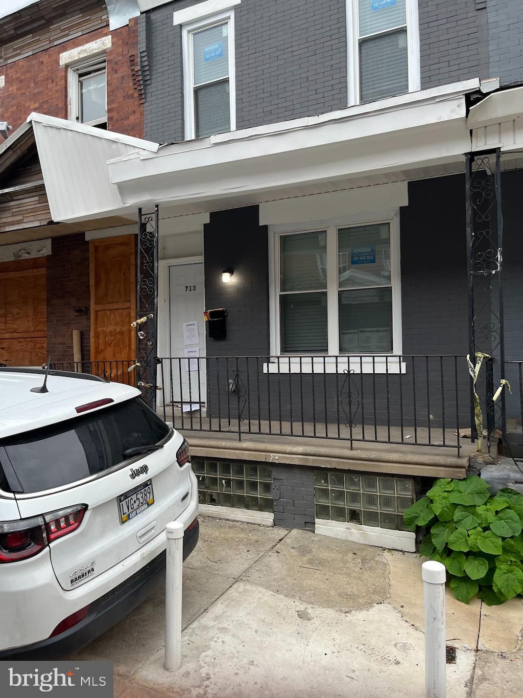 doorway to property featuring a porch