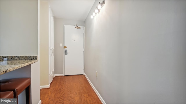 hallway featuring light wood-type flooring