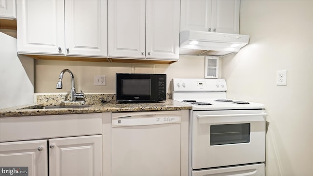 kitchen featuring white appliances, white cabinetry, stone counters, and sink