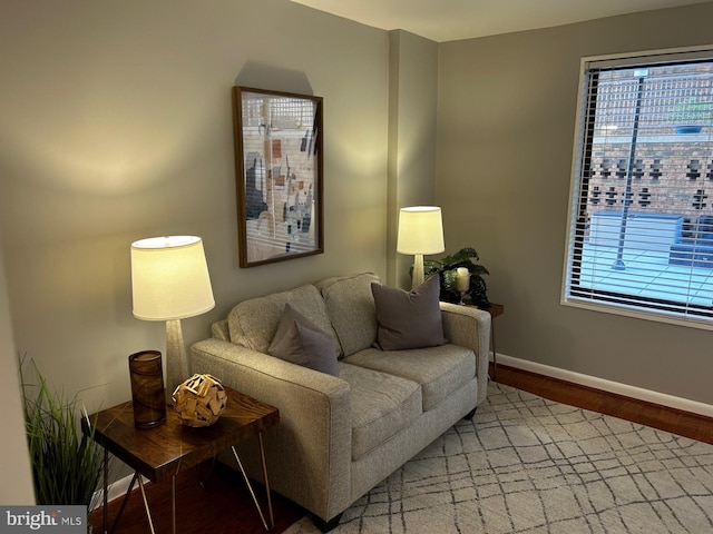 living room featuring light hardwood / wood-style flooring and plenty of natural light