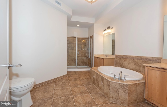 full bathroom with independent shower and bath, vanity, toilet, and tile flooring