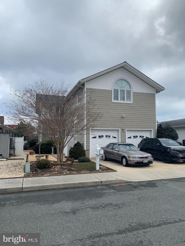 view of property featuring a garage