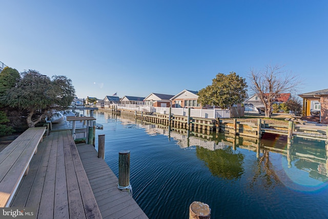 dock area featuring a water view