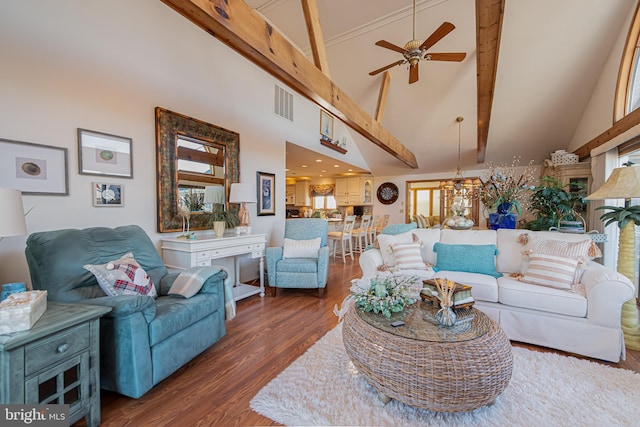 living room featuring beam ceiling, high vaulted ceiling, ceiling fan with notable chandelier, and dark hardwood / wood-style flooring