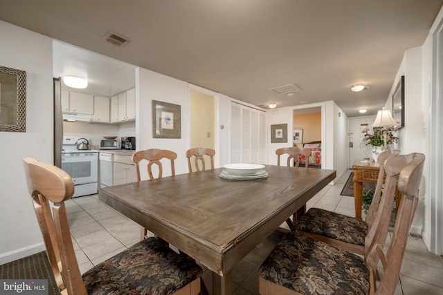 view of tiled dining room