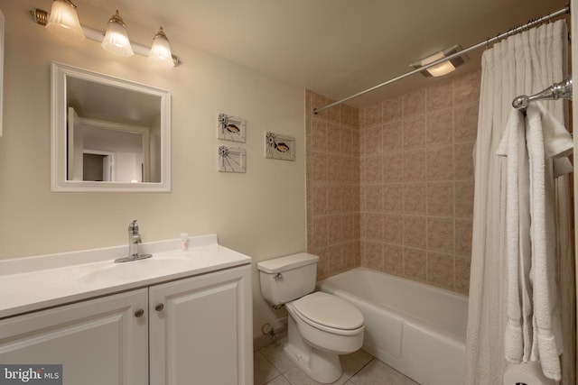 full bathroom with tile floors, toilet, shower / tub combo, and vanity