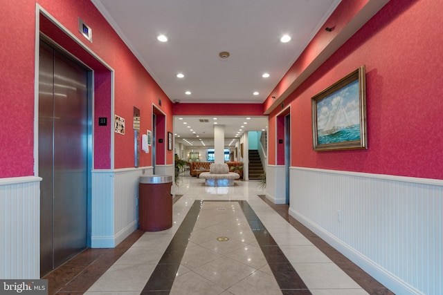 hallway featuring tile flooring and elevator