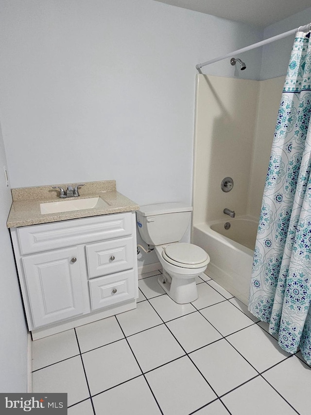 full bathroom with shower / tub combo, tile flooring, toilet, and vanity