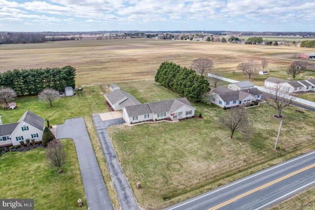 birds eye view of property featuring a rural view