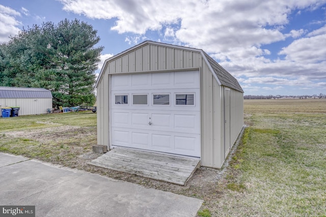 garage featuring a yard