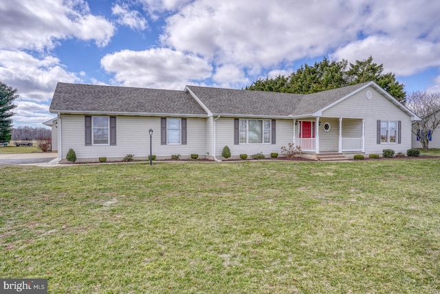 ranch-style house featuring a front yard