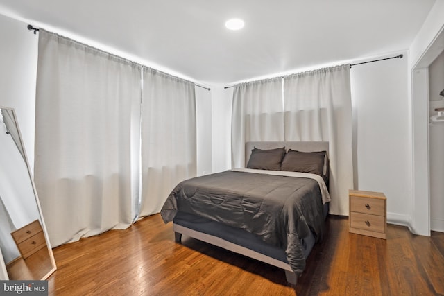 bedroom featuring wood-type flooring