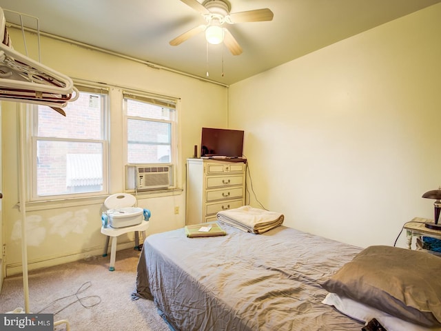 bedroom featuring light carpet and ceiling fan