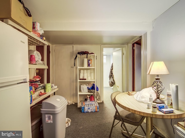 interior space with dark colored carpet