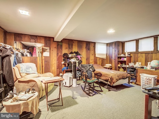 interior space with wooden walls and light colored carpet