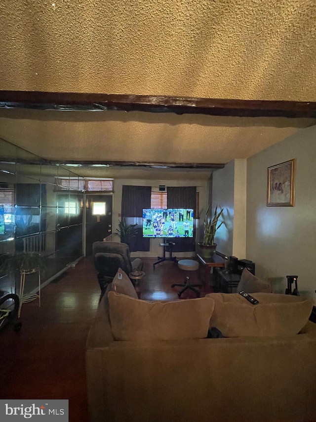 living room with a textured ceiling