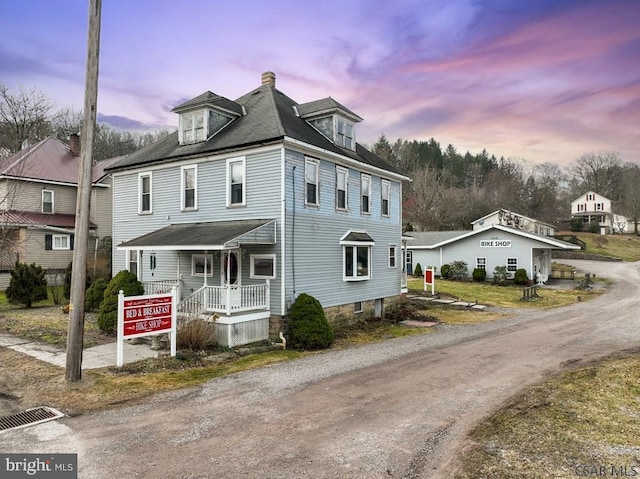 view of front facade with covered porch