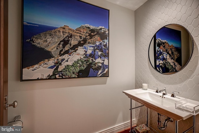 bathroom with backsplash and a mountain view