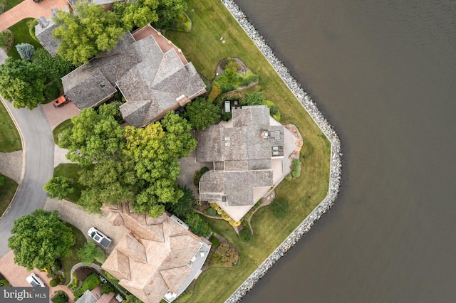 drone / aerial view with a water view