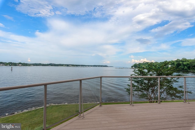 deck featuring a water view