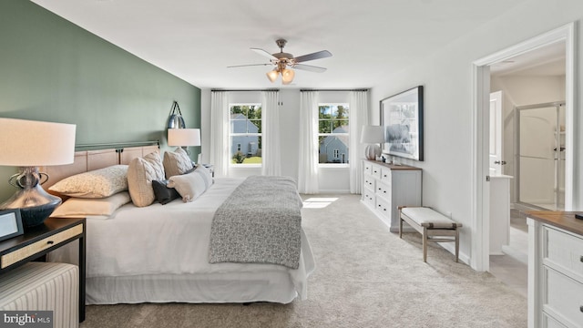 bedroom featuring ceiling fan and light colored carpet